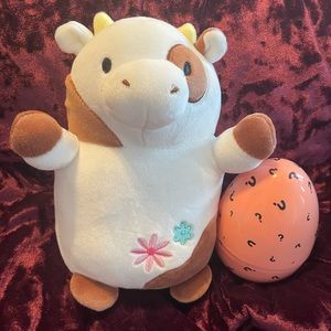 Squishmallow cow hugmee